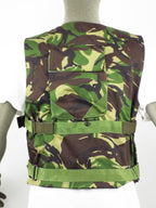 Rear view of the British DPM woodland camo protective vest showing the back pocket, webbing straps, and secure popper stud fasteners.