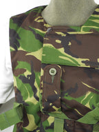 Close-up of the front chest area of the British army DPM flak vest, highlighting the central pocket, rank slide, and heavy-duty popper stud.