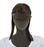 Front view of a genuine German Army Flecktarn camo winter hat with extended side flaps.