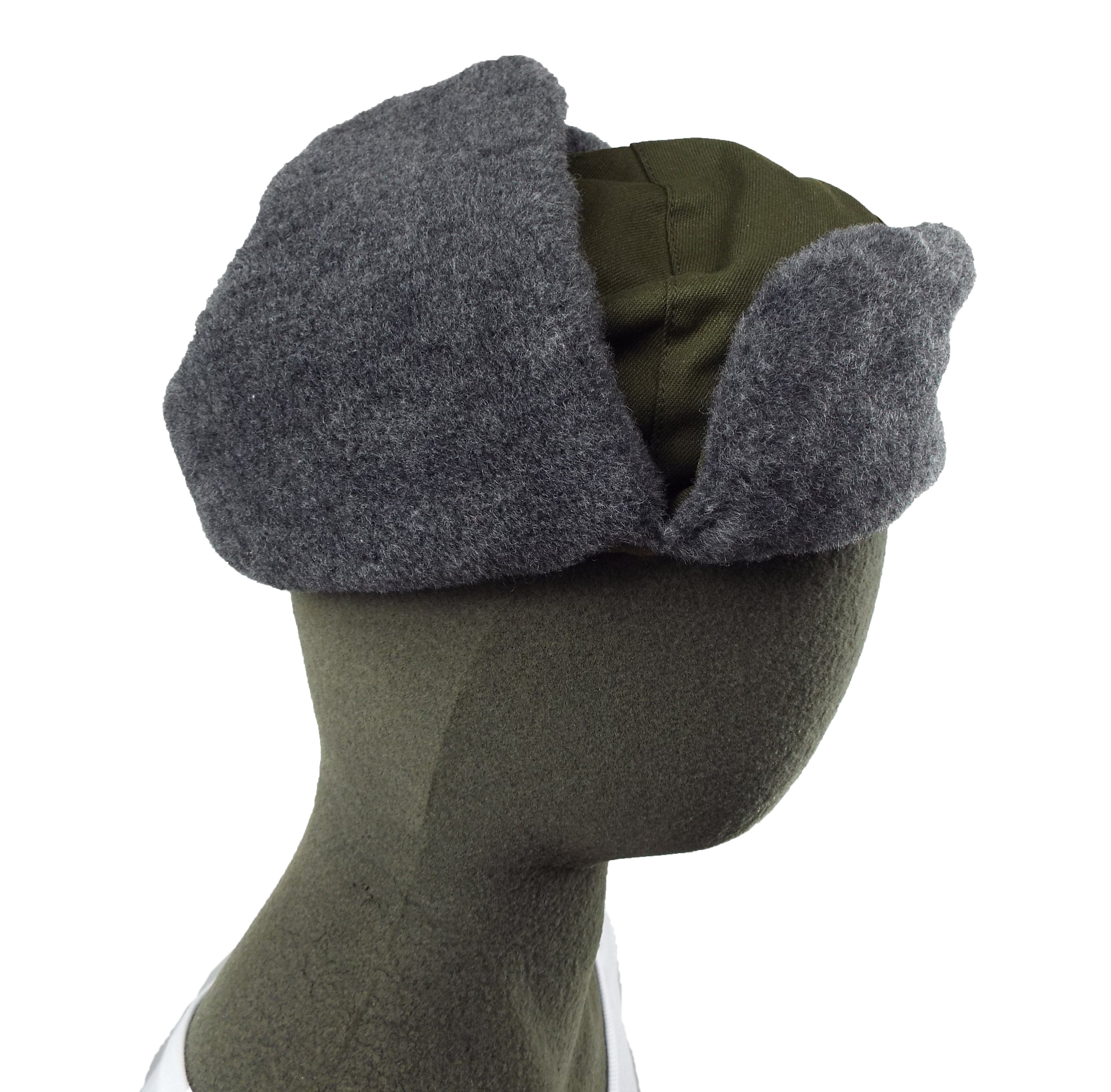 Side view of the Czech Ushanka with ear flaps partially detached to show the synthetic grey fur lining interior.