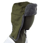 Side profile of a Czech Army Ushanka with green cotton-polyester shell and grey faux fur ear flaps secured down.
