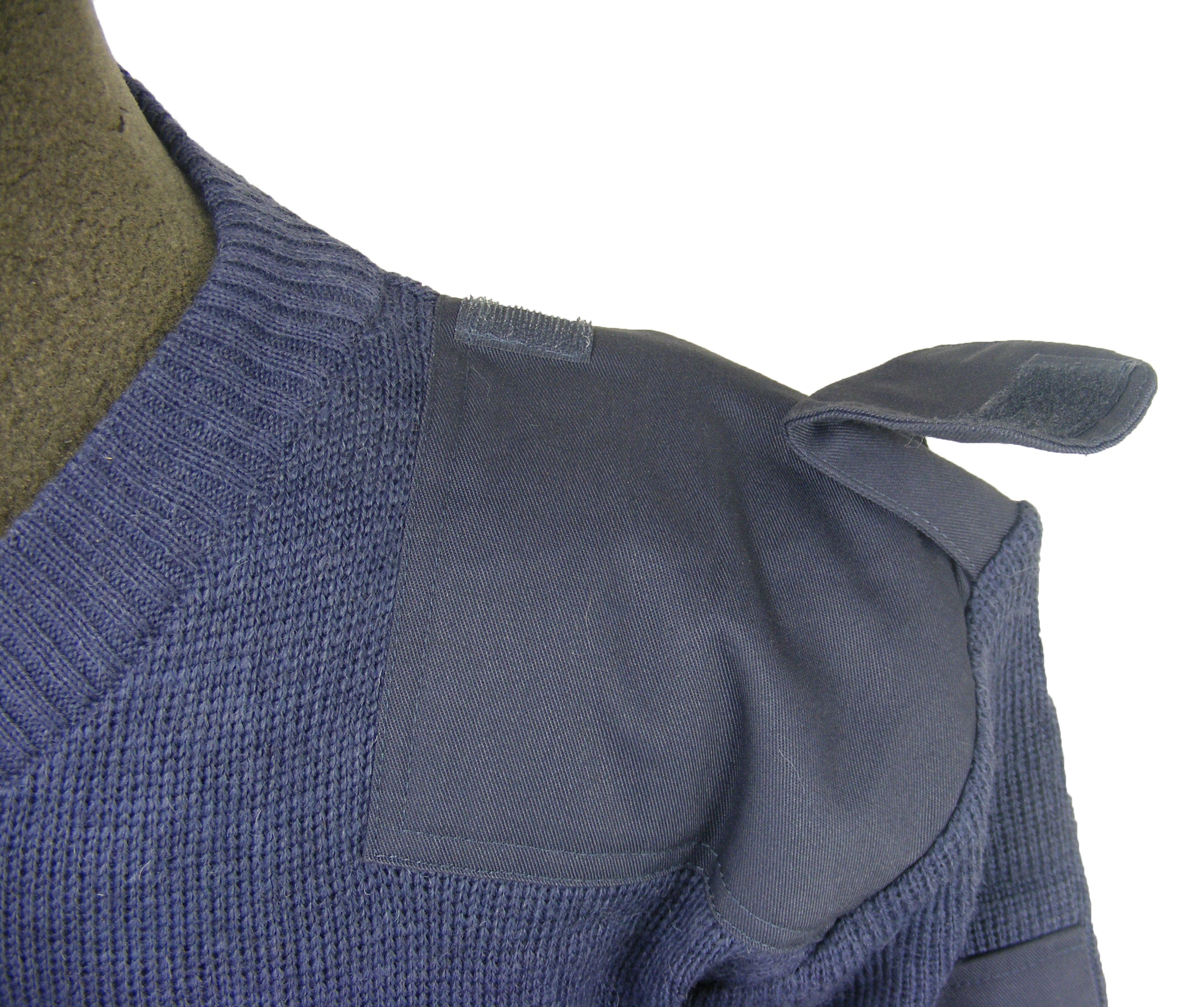 Close-up of the RAF pullover shoulder detailing with hook-and-loop fasteners on the epaulette for gear attachment.