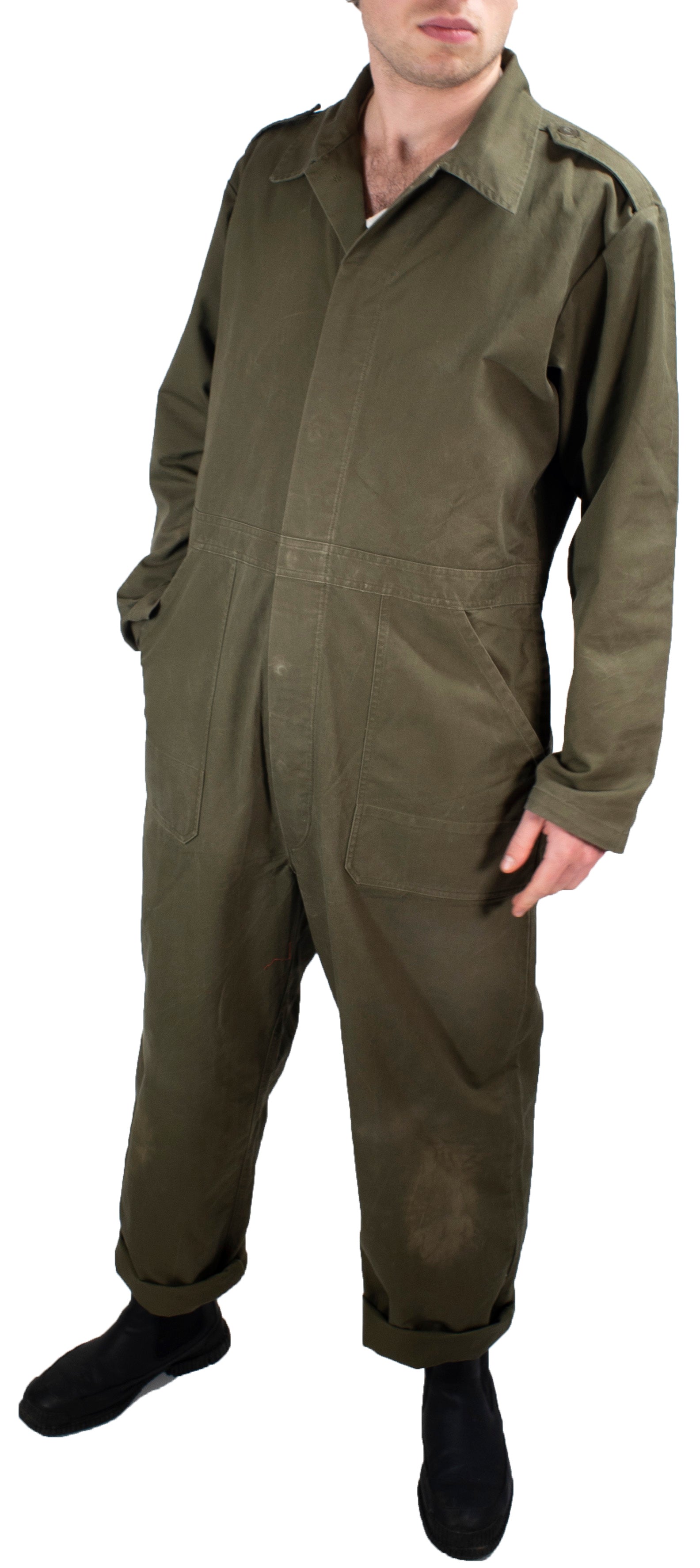 Three-quarter view of olive drab Dutch military coveralls, highlighting the durable cotton weave and front pocket design.
