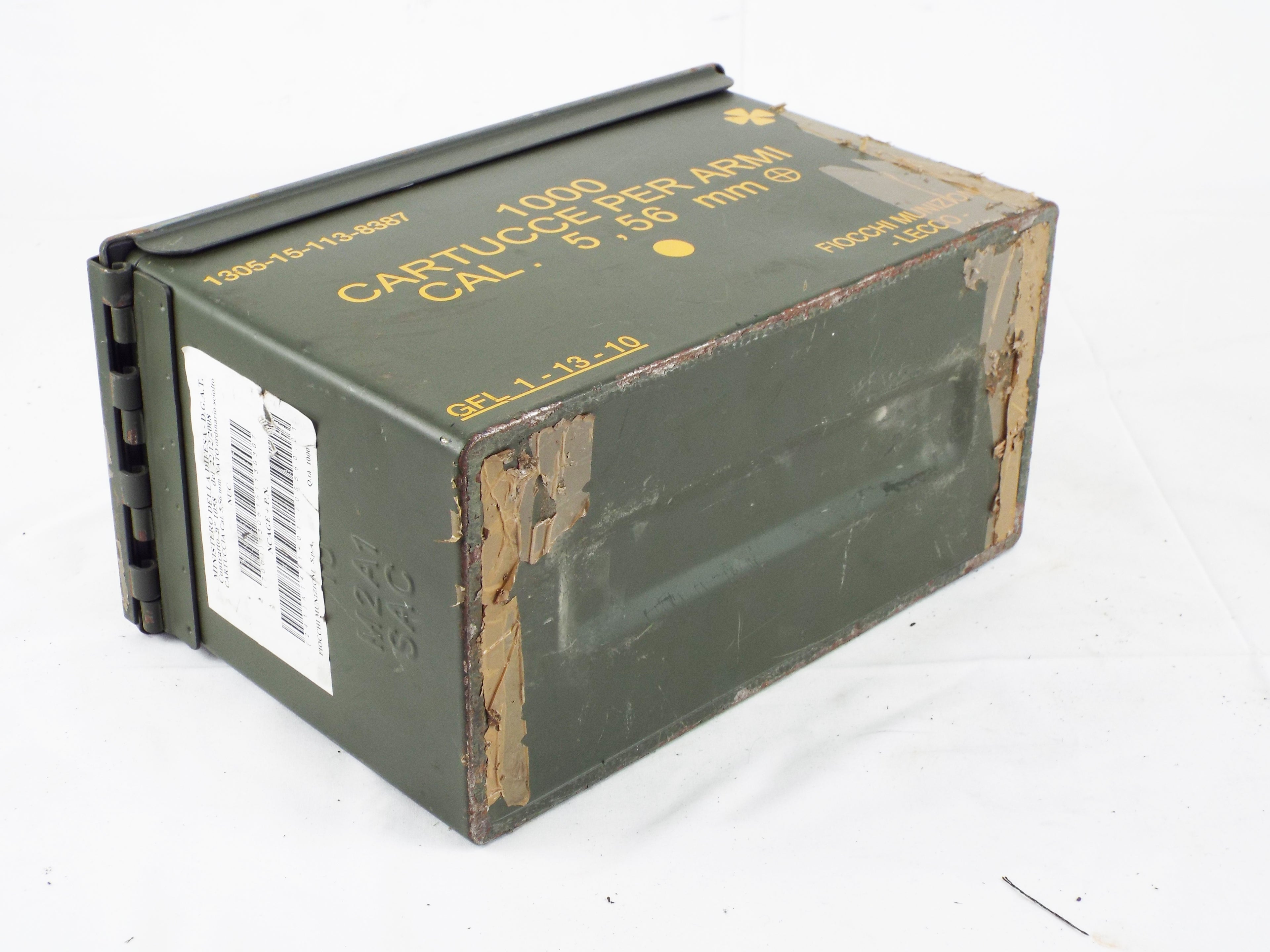 Bottom perspective of the Grade 1 olive green ammunition box showing residue from old tape and original Italian military stenciled markings.